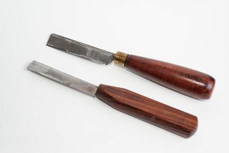 Picture of oboe reed knives, Left a Rigotti knife and right a Landwell knife